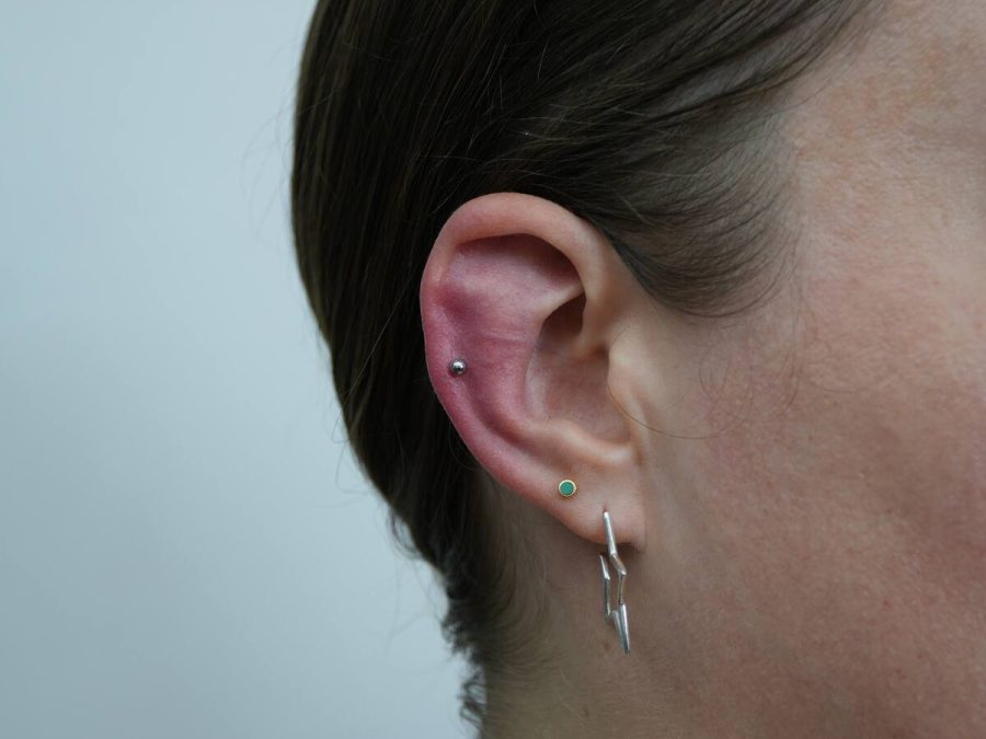 Curated ear piercing stack done at Sae Collective Studio