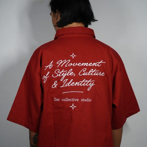 Sae Collective Studio brick red shirt reading A Movement of Style, Culture and Identity